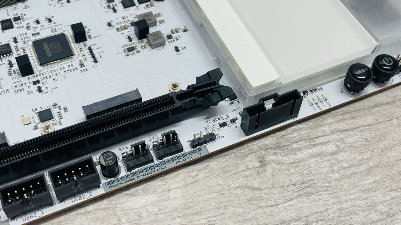An NZXT N9 Z890 motherboard on a desk with port covers removed.