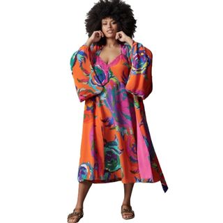 model wearing tropical bright slip dress and kimono