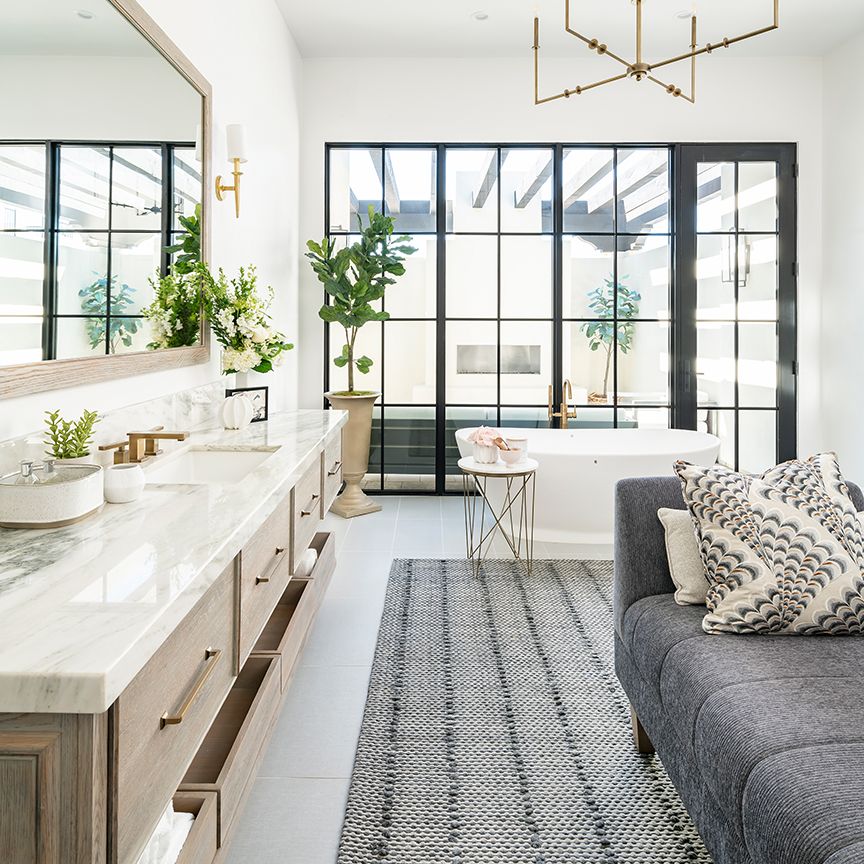 a bathroom with a seating area