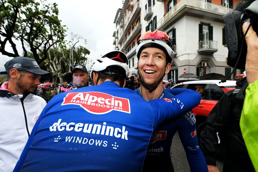 Kaden Groves celebrates with Alpecin-Deceuninck teammates after winning stage 5 at the Giro d&#039;Italia