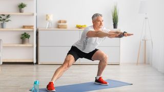 a man doing lateral lunges 