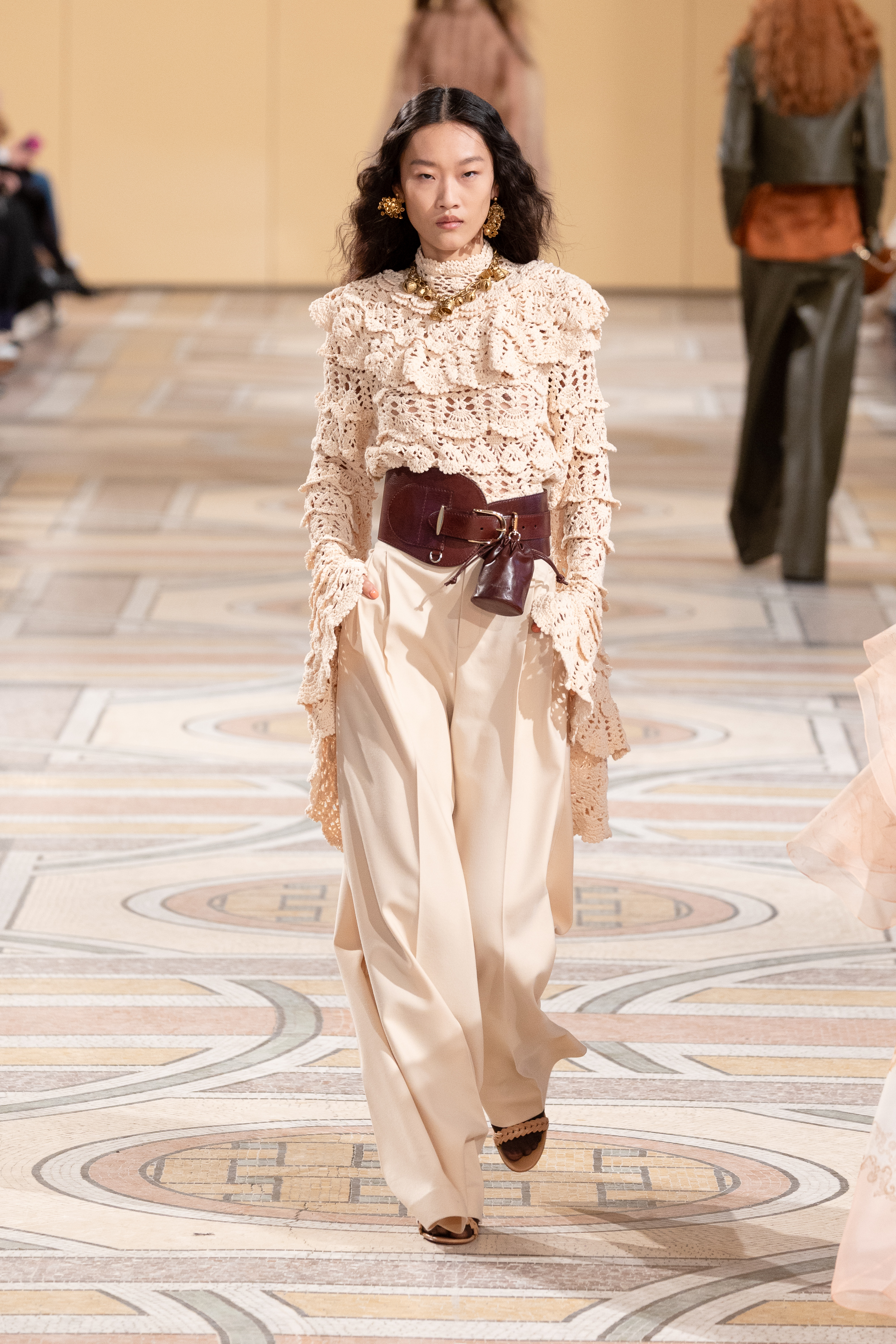Autum/Winter 25 trouser trends - cream trousers crochet top, Zimmermann runway
