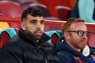 David Raya of Arsenal looks on from the bench prior to the Premier League match between Brentford FC and Arsenal FC at Gtech Community Stadium on November 25, 2023 in Brentford, England.