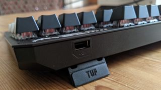 The USB 2.0 port on the back right side of the Asus TUF Gaming K3 keyboard