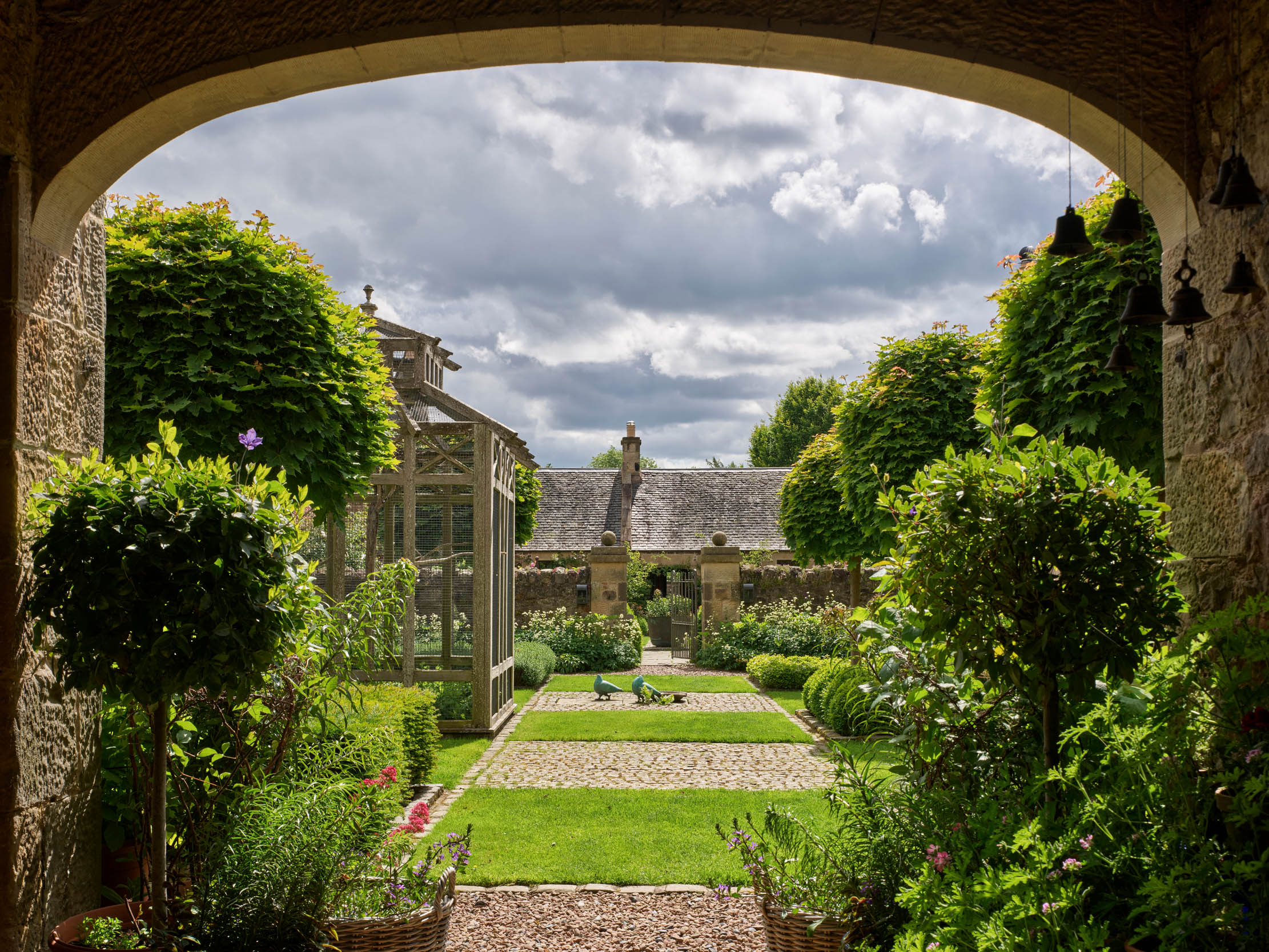 The Upper courtyard at Broadwoodside, East Lothian, photographed by Paul Highnam for Country Life. ©Country Life