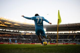 Khvicha Kvaratskhelia takes a corner kick during the Italian Serie A football match between Torino and Napoli at the Stadio Grande Torino in Turin on December 1, 2024.