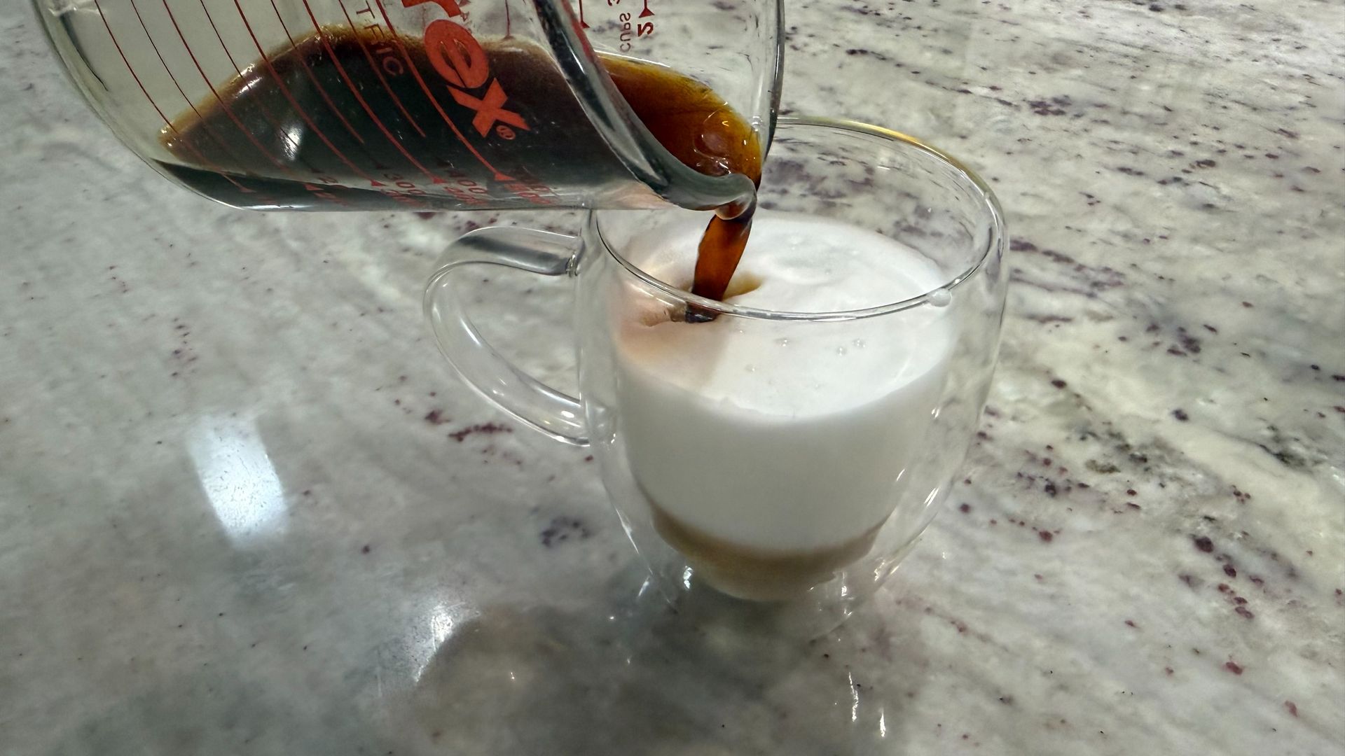 Braun OptiBrew Pro coffee shot and frothed milk