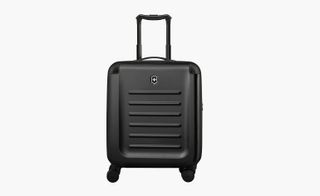 Spectra 2.0 Global Carry-On luggage. A black hard shell case on wheels with a handle.