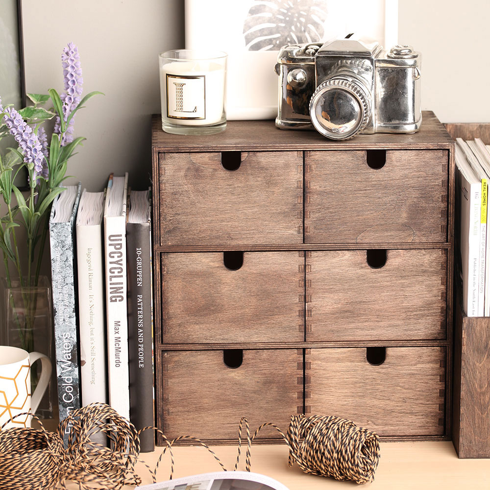 rustic box with books and flower plant