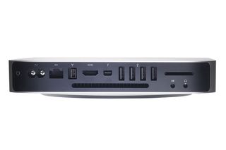 All of the ports on the Apple Mac Mini Mid 2011 are round the back.