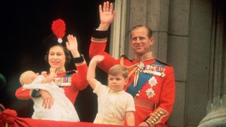 Queen Elizabeth and Prince Philip with a young King Charles and Princess Anne