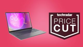 black opened laptop against pink background
