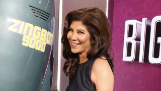 Julie posing with Zingbot 9000 on the Big Brother set