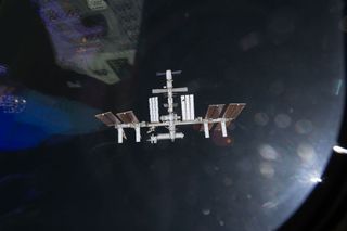 This view of the International Space Station was taken as it appeared on May 18, 2011 to the crew of space shuttle Endeavour just before the shuttle docked at the orbiting laboratory.