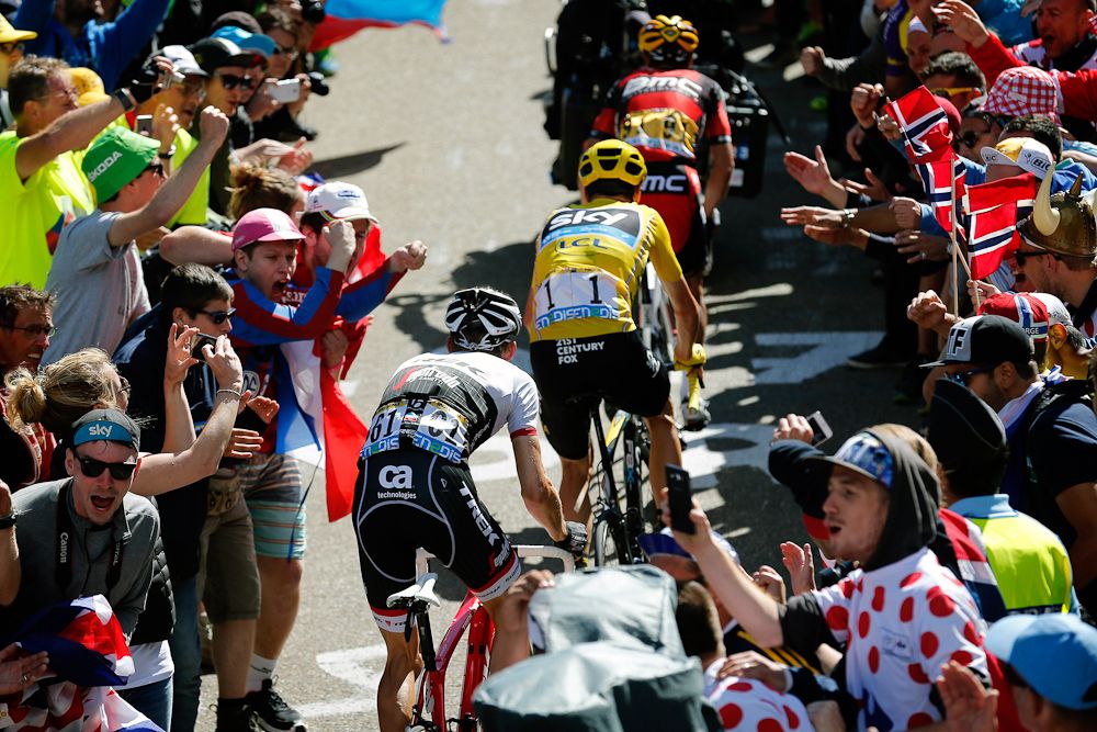 Richie Porte, Chris Froome and Bauke Mollema make their way through the crowds on Mont Ventoux