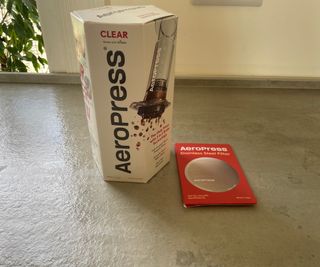 AeroPress coffee maker box on the countertop