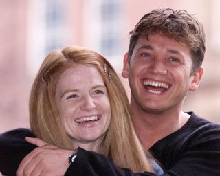 Former Eastenders stars Sid Owen (Ricky) and Patsy Palmer (Bianca) are all smiles on their first day back filming in Manchester, for the London based soap opera after both had left the show to pursue other interests.