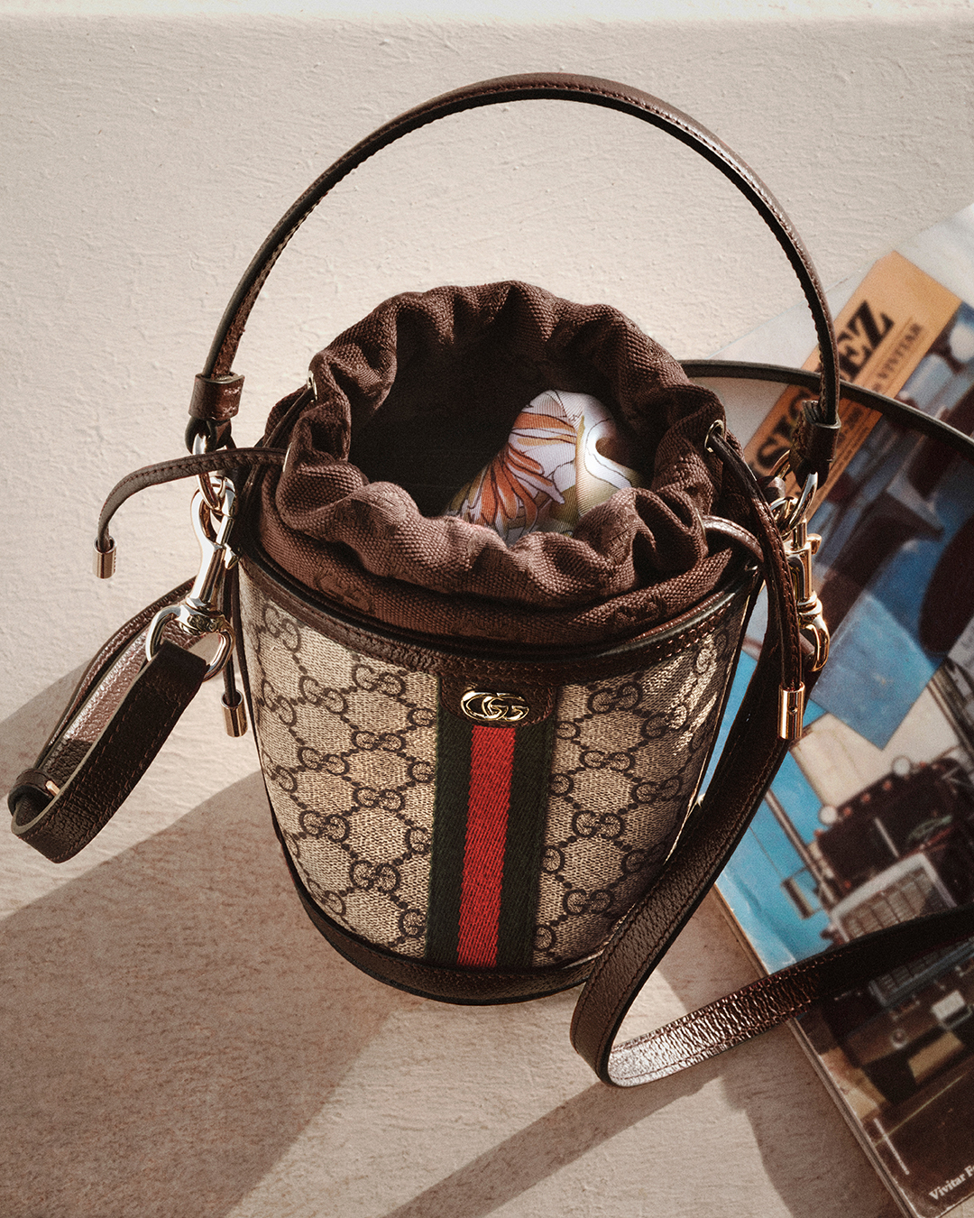 Gucci monogram bag in the new Gucci campaign.