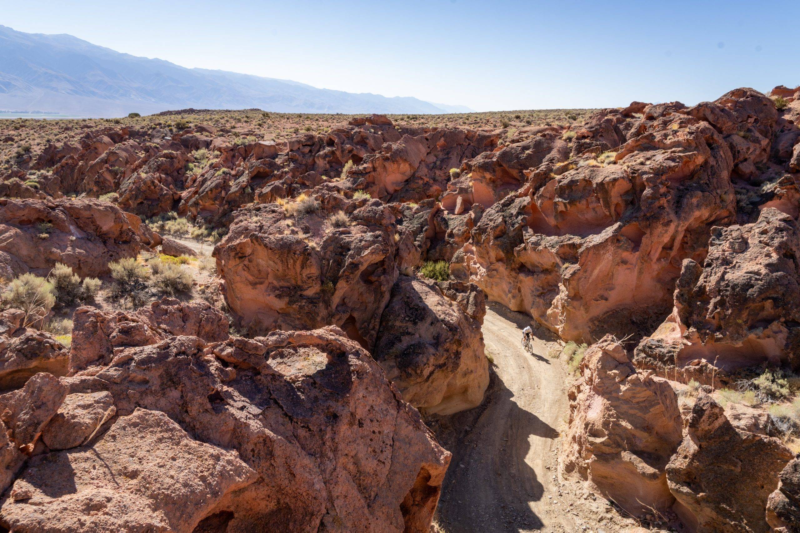 A rider heads through the rocky terrain of the Mammoth Lakes mountains at Mammoth TUFF