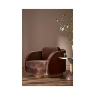 brown velvet chair with wood round swivel base