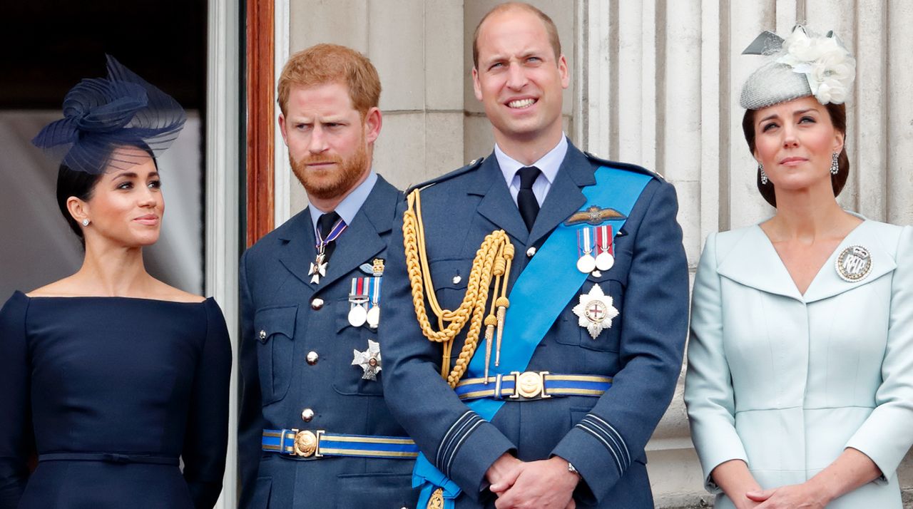 Meghan, Duchess of Sussex, Prince Harry, Duke of Sussex, Prince William, Duke of Cambridge and Catherine, Duchess of Cambridge watch a flypast to mark the centenary of the Royal Air Force from the balcony of Buckingham Palace on July 10, 2018 in London, England.