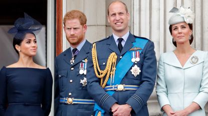 Meghan, Duchess of Sussex, Prince Harry, Duke of Sussex, Prince William, Duke of Cambridge and Catherine, Duchess of Cambridge watch a flypast to mark the centenary of the Royal Air Force from the balcony of Buckingham Palace on July 10, 2018 in London, England.