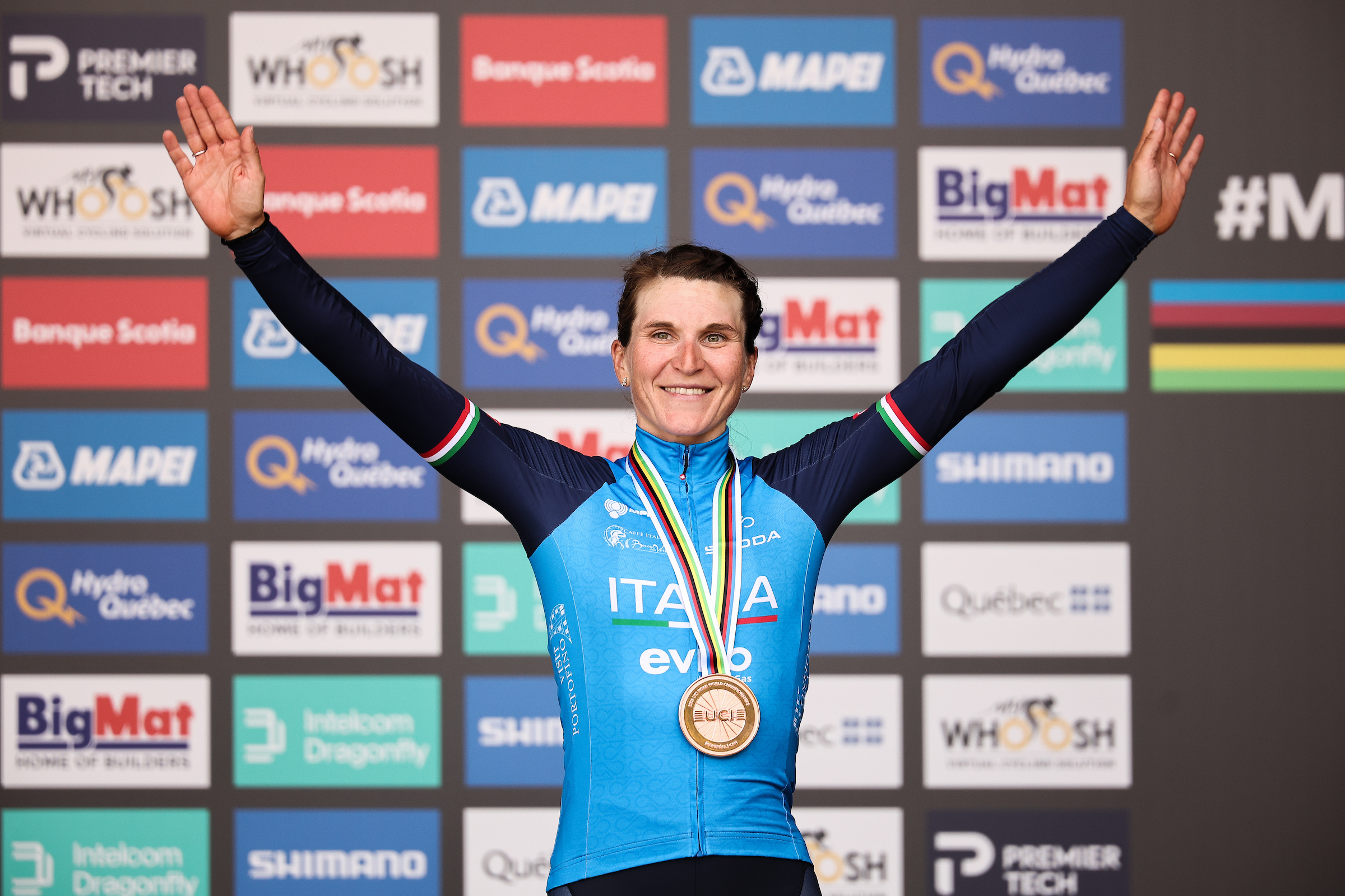 Elisa Longo Borghini on the podium receiving bronze medal at the Road World Championships 2026