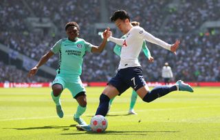 Brighton and Hove Albion’s Tariq Lamptey (left) and Tottenham Hotspur’s Son Heung-min in action during the Premier League match at the Tottenham Hotspur Stadium, London. Picture date: Saturday April 16, 2022