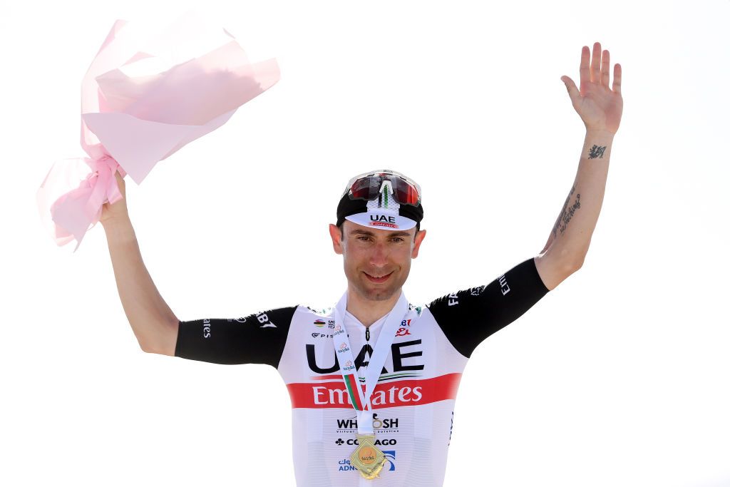 YITTI HILLS OMAN FEBRUARY 14 Diego Ulissi of Italy and UAE Team Emirates celebrates at podium as stage winner during the 12th Tour of Oman 2023 Stage 4 a 2049km stage from Izki to Yitti Hills 147m TourofOman on February 14 2023 in Yitti Hills Oman Photo by Alex BroadwayGetty Images