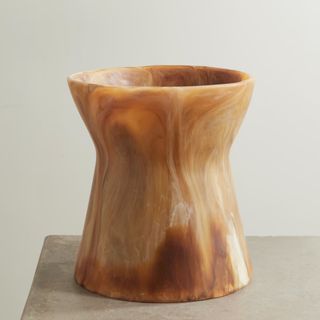 A brown and white marble vase