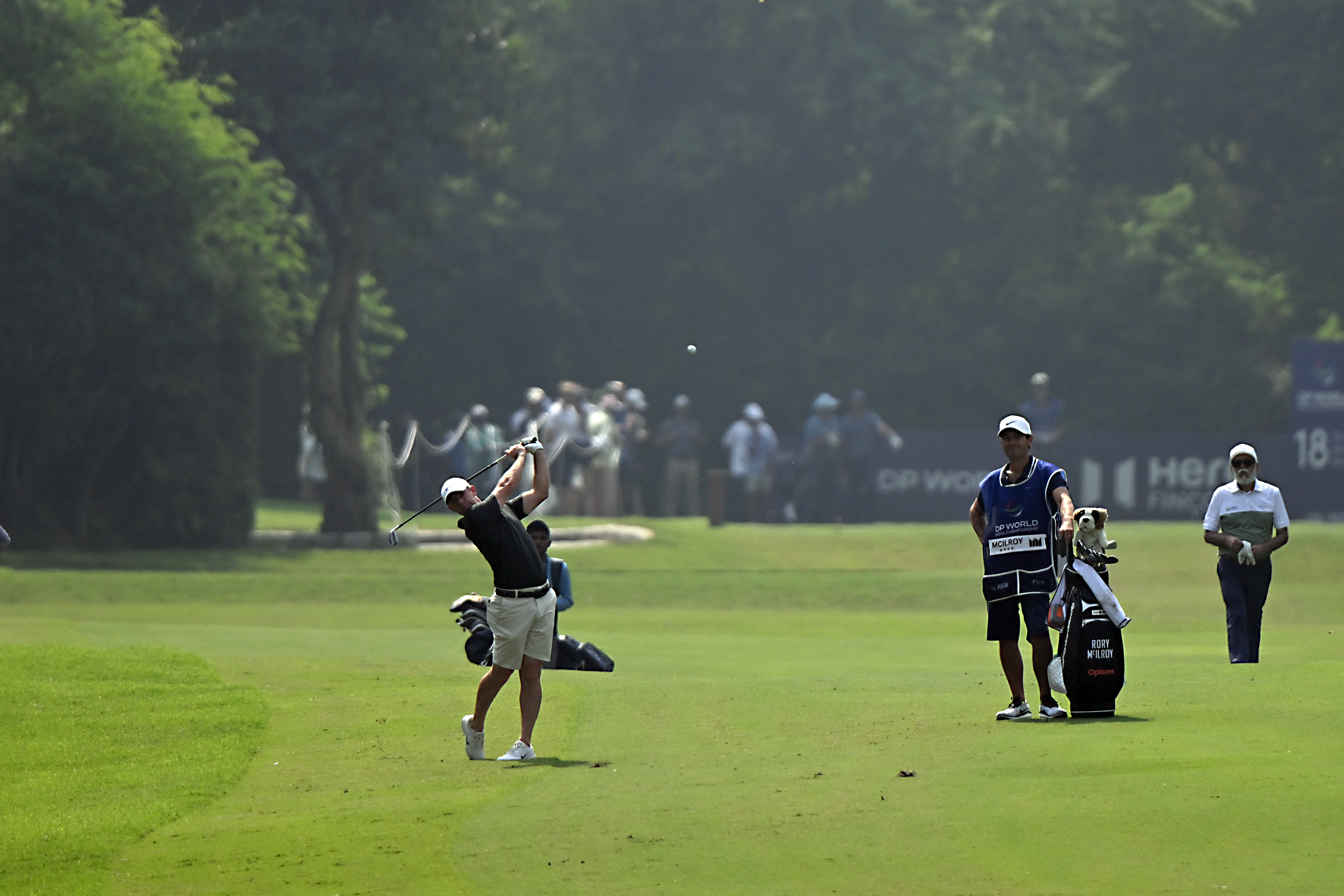 Rory McIlroy hits an iron shot into the green