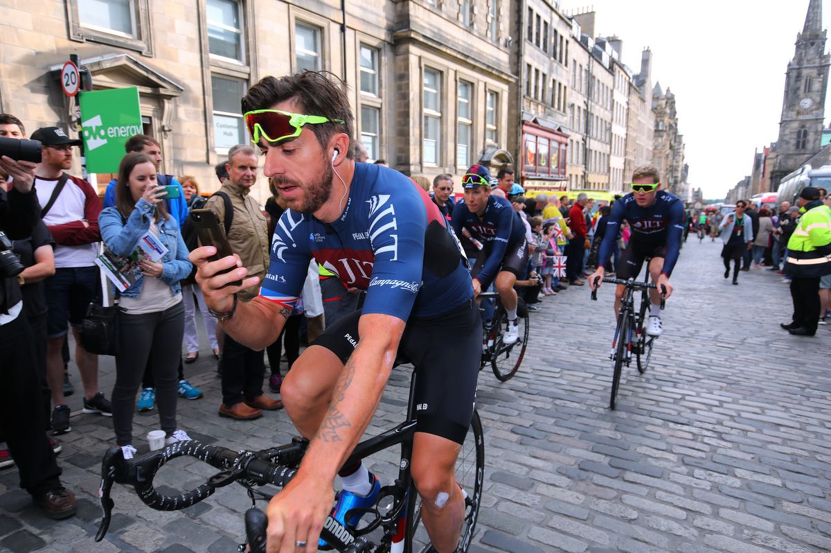 A last minute phone check for Russell Downing (JLT Condor)