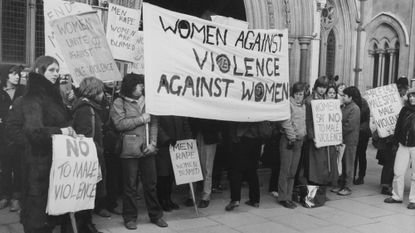 Women Against Violence Against Women activists stage a protest outside the High Court at the Royal Courts of Justice in Westminster, London, England, 7th January 1981. They are protesting against Judge Bertram Richards&#039; decision to fine, rather than imprison, John Allen who had raped a teenage hitchhiker. (Photo by Gary Stone/Central Press/Hulton Archive/Getty Images)