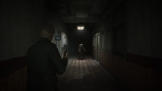 Silent Hill 2 Remake screenshot showing James approaching an enemy in a dark corridor