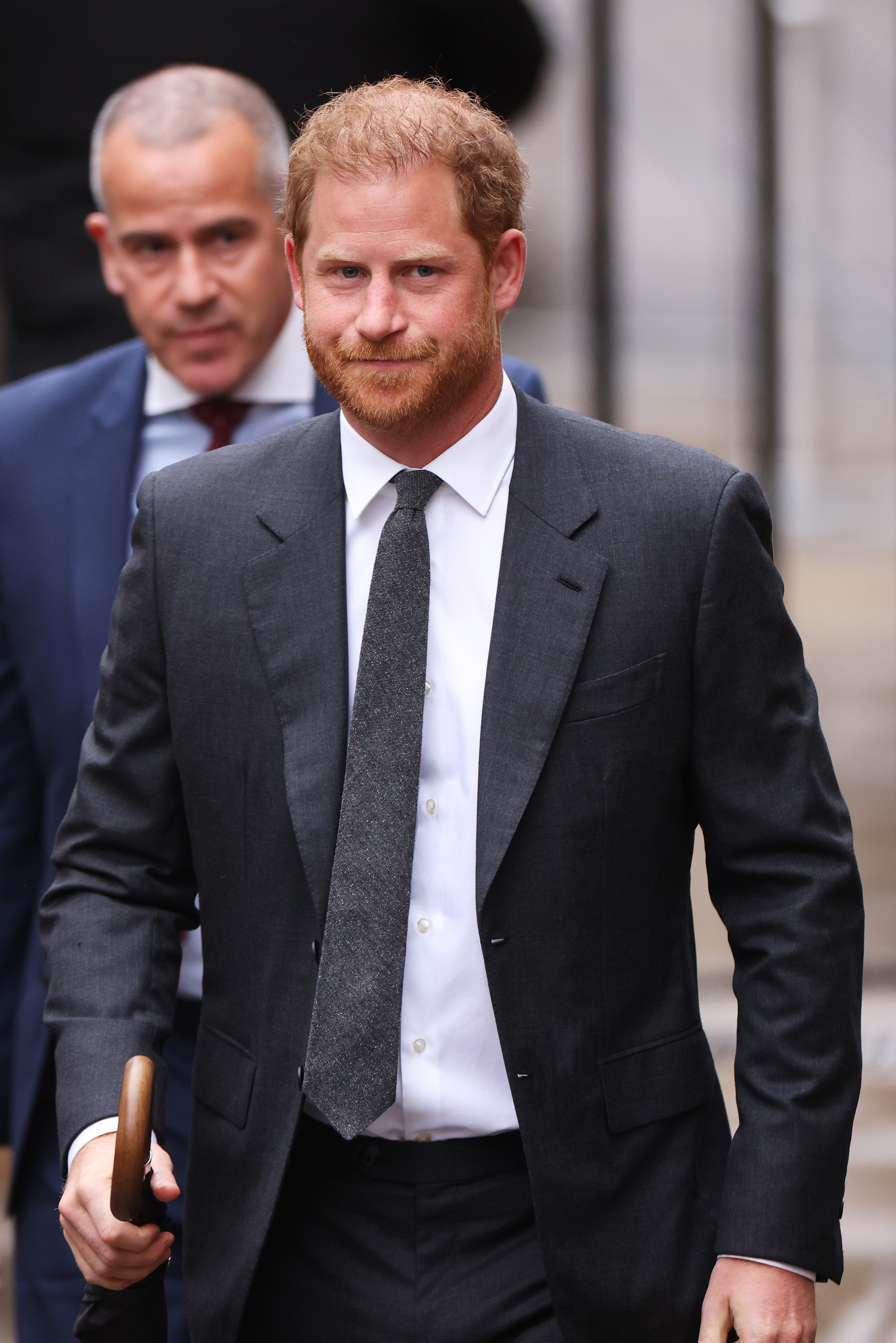 Prince Harry wearing a suit and tie