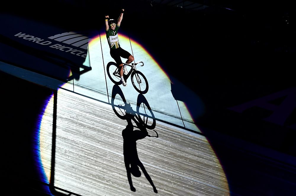 Mark Cavendish of Great Britain celebrates victory in the Mens 10km Scratch Race on day four of the London Six Day