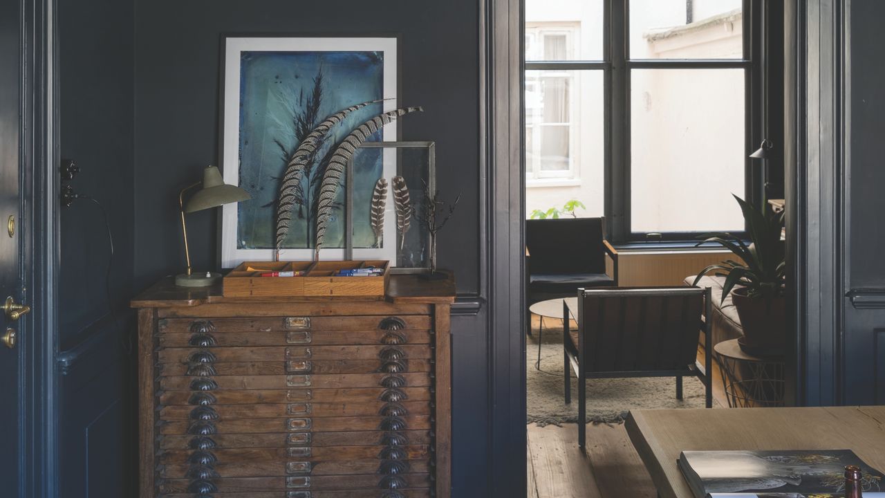 Image of a room painted in &#039;Railings&#039; by Farrow &amp; Ball — a dark grayish blue color. 