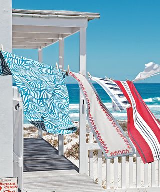 Beach towels hanging from clothes line