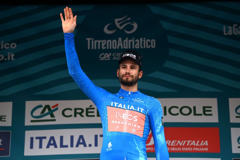 FOLIGNO ITALY MARCH 08 Filippo Ganna of Italy and Team INEOS Grenadiers Blue Leader Jersey celebrates at podium during the 58th TirrenoAdriatico 2023 Stage 3 a 216km stage from Follonica to Foligno 231m UCIWT TirrenoAdriatico on March 08 2023 in Foligno Italy Photo by Tim de WaeleGetty Images