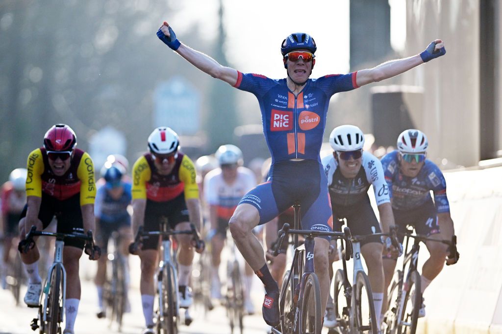 NOKERE BELGIUM MARCH 19 Nils Eekhoff of Netherlands and Team Picnic PostNL celebrates at finish line as race winner during the 79th Danilith Nokere Koerse 2025 Mens Elite a 1881km one day race from Deinze to Nokere on March 19 2025 in Nokere Belgium Photo by Luc ClaessenGetty Images