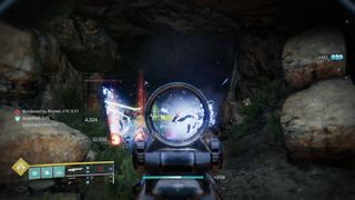 Destiny 2 Thunderlord Exotic machine gun firing at loot cave enemies