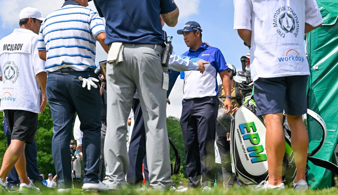 Hidkei Matsuyama chats to officials as he is disqualified 