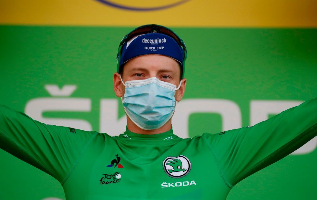 Team Deceuninck rider Irelands Sam Bennett celebrates his green jersey of best sprinter on the podium at the end of the 20th stage of the 107th edition of the Tour de France cycling race 36 km between Lure and La Planche des Belles Filles on September 19 2020 Photo by Sebastien Nogier POOL AFP Photo by SEBASTIEN NOGIERPOOLAFP via Getty Images