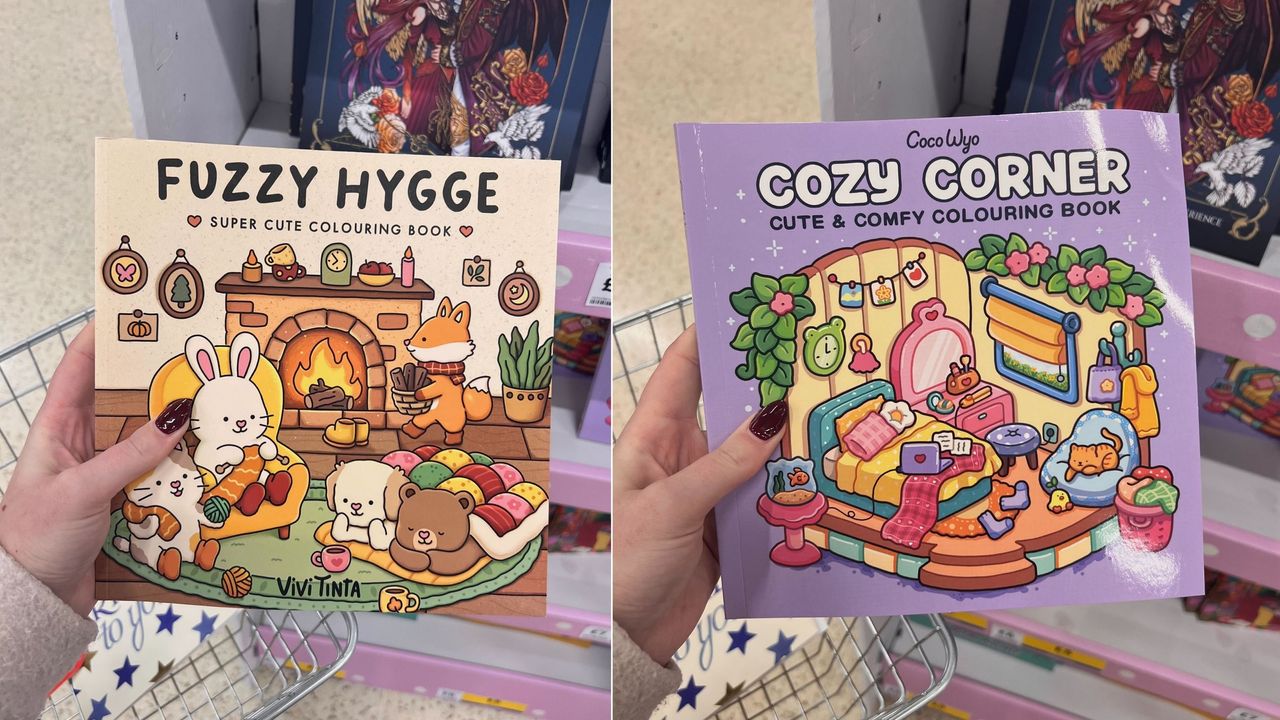 Layla Al-Ani's hand holding a Fuzzy Hygge colouring book and a Cozy Corner colouring book.