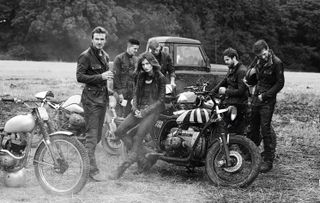 Photo of models with motorcycle