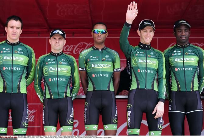 Pierre Rolland gives the crowd at wave as Europcar are on stage