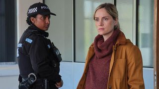 Sophie Rundle as PC Joanna Marshall alongside a fellow officer in ITV's After the Flood
