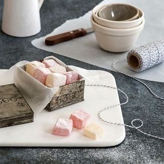 turkish delight with parchment paper and vintage metal tin