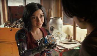 Alita: Battle Angel giving her heart to Hugo