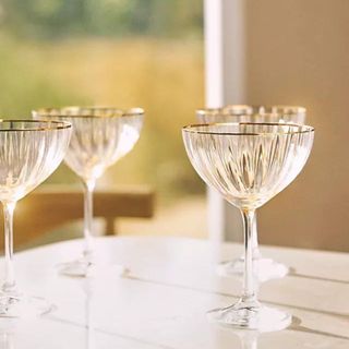 Cocktail glasses sitting on a table